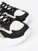 Black-beige women's sneakers with thick sole