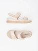 Beige women's sandals with velcro straps