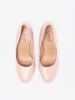 Pink patent pumps