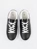 Women's black sneakers with white inserts