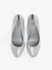 Light grey patent leather pumps