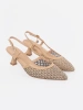 Beige perforated low heel pumps