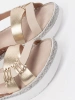 Beige platform sandals with metallic embellishment