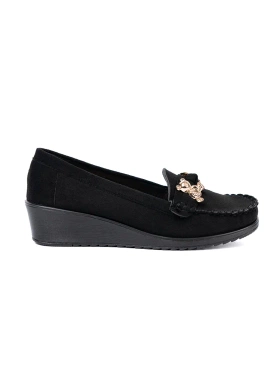 Black suede loafers with decorative bear