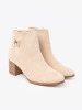 Elegant light beige ankle boots