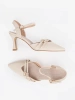 Light beige slingback pumps