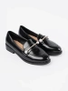 Black patent loafers with pearls