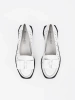 White perforated shoes with a bow