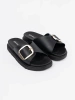 Black women's slides with a gold buckle