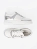 White silver sneakers with shimmering details