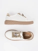 White and beige leather sneakers with a pin Sergio Leone