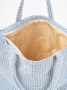 Blue and white checkered beach bag