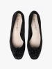 Black pumps with decorative beaded brooch