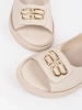 Beige sandals with embellishment