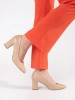 Beige block heel pumps