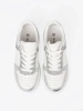 White silver sneakers with shimmering details