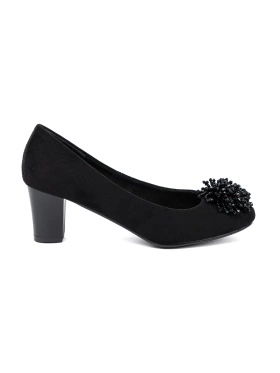 Black pumps with decorative beaded brooch