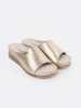 Women's gold platform slides