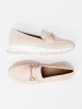 Light beige moccasins with decorative gold element