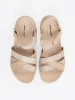 Light beige sandals on a white platform