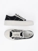 Black lace-up sneakers with thick sole