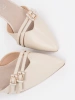 Light beige slingback pumps