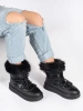 Chic Black Snow Boots with Cozy Fur and Chunky Soles