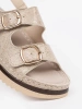 Beige sandals with golden elements