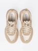 Beige sneakers with decorative golden heart
