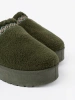 Dark green, soft shoes similar to snow boots without a heel
