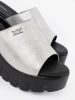 Silver slides on black platform