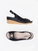 Black wedge sandals with a buckle