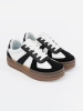 Black and white platform sneakers