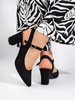 Chic Black Heels by Sergio Leone