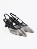 Black perforated low heel court shoes