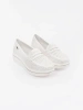 White loafers with thick soles