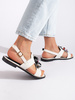 White sandals with decorative detail