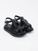 Elegant black leather platform sandals