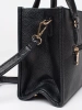 Black handbag with decorative zipper