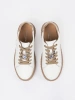 White and beige leather sneakers with a pin Sergio Leone