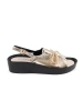 Golden wedge sandals with leather insole