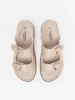 Beige sandals with golden elements
