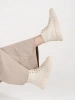 Light beige women's high-top sneakers on a platform