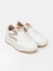 White and beige platform sneakers
