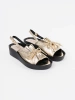 Golden wedge sandals with leather insole