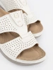 White comfortable slides with cutouts