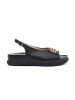 Black flat sandals with embellishment
