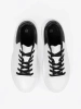 White sneakers with black inserts
