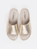 Women's gold platform slides