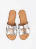 Silver sandals with a gold ornament
